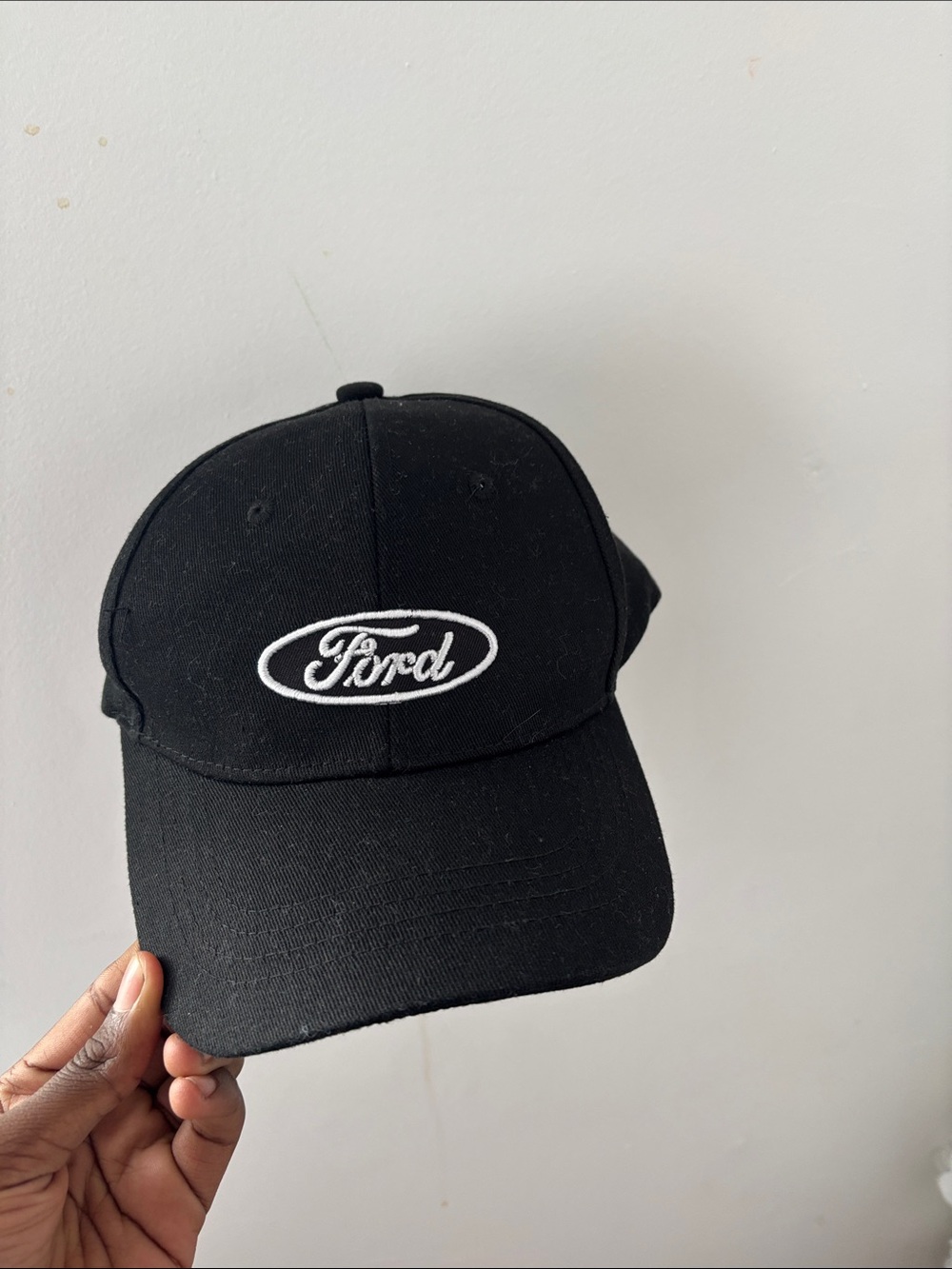 New baseball ford cap with oval logo in the front with the tag